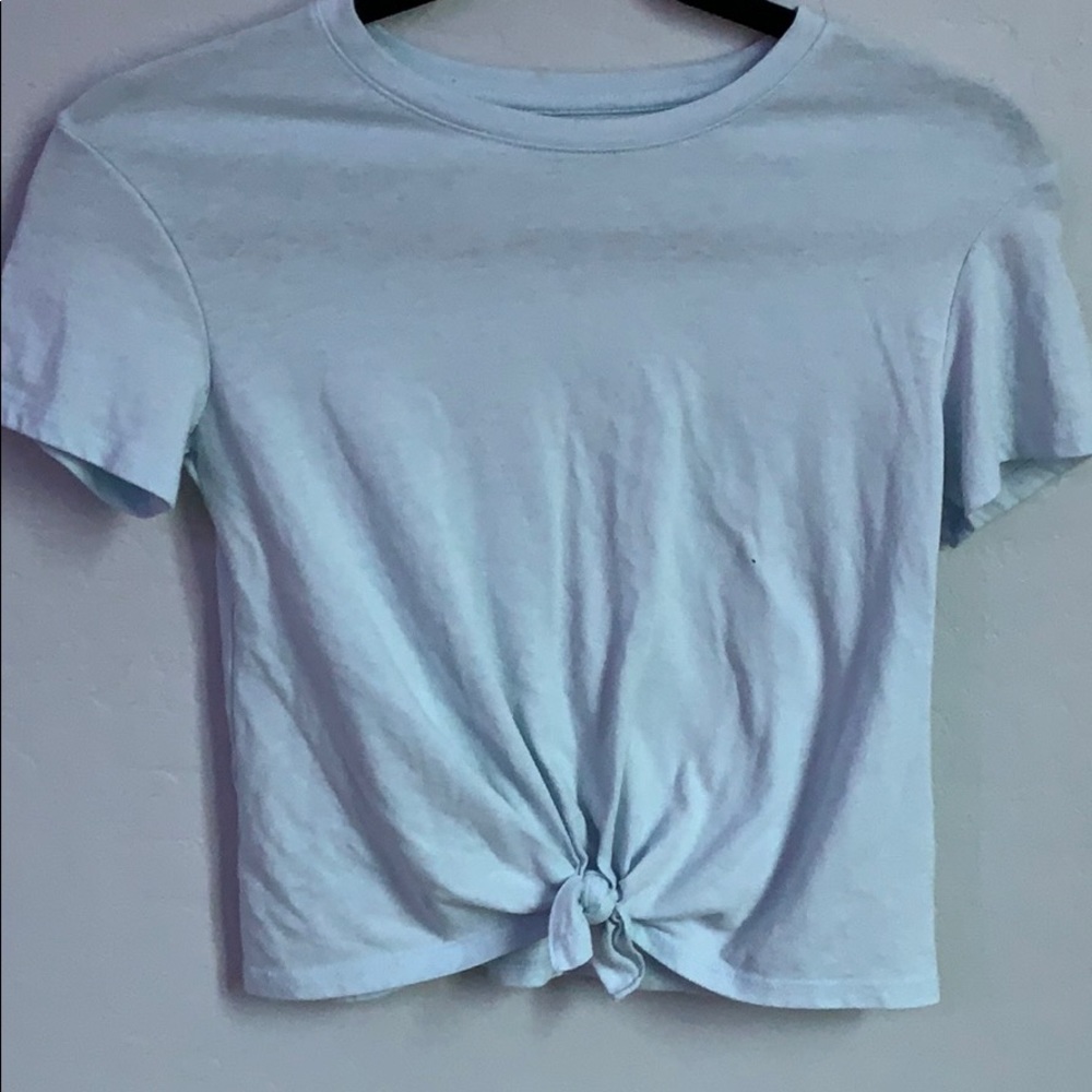 girls art class tied blue shirt